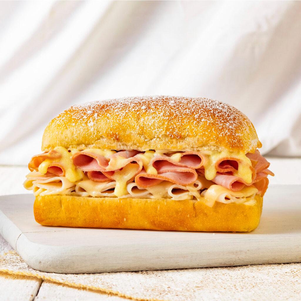 A Monte Cristo sandwich on a cutting board