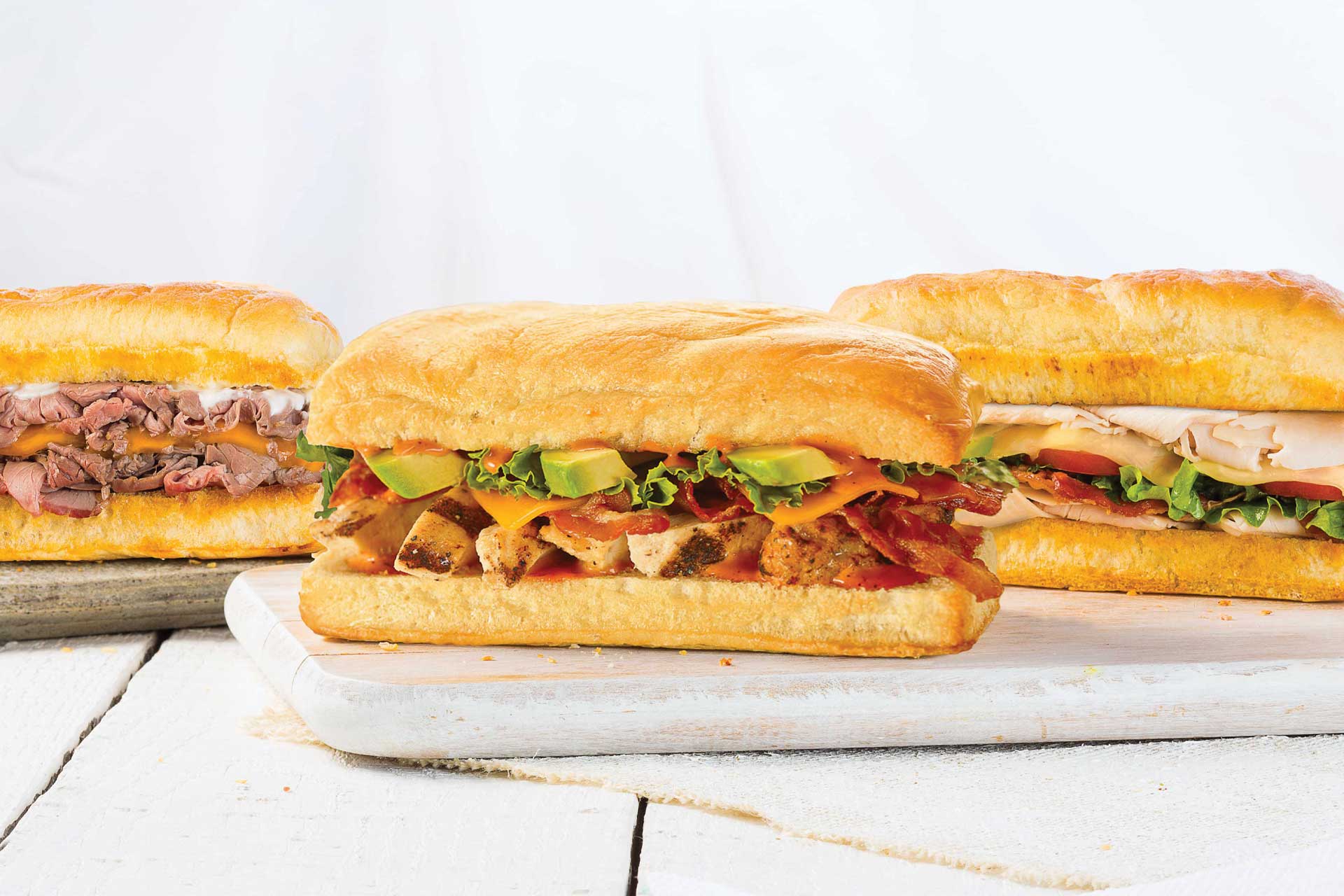 Sandwiches from Earl of Sandwich including chipotle chicken avocado, the earl's club, and 1762® The Original
