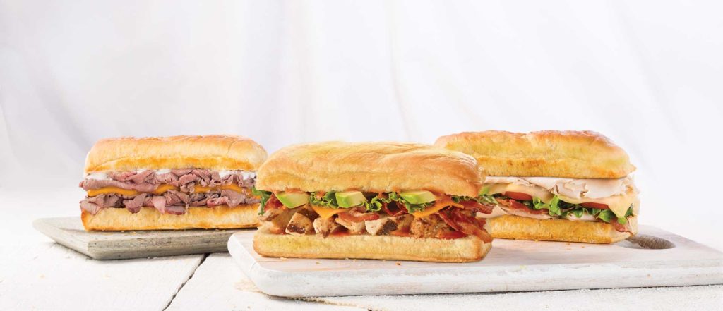 Earl of Sandwich three sandwiches including 1762® The Original, Chipotle Chicken Avocado, and The Earl's Club