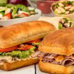 Earl of Sandwich Order Online with sandwiches featuring The Earl's Club, 1762® The Original, Chicken Bacon Avocado Wrap, and a salad